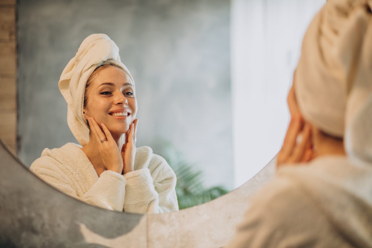 Woman Home Applying Cream Mask (1)