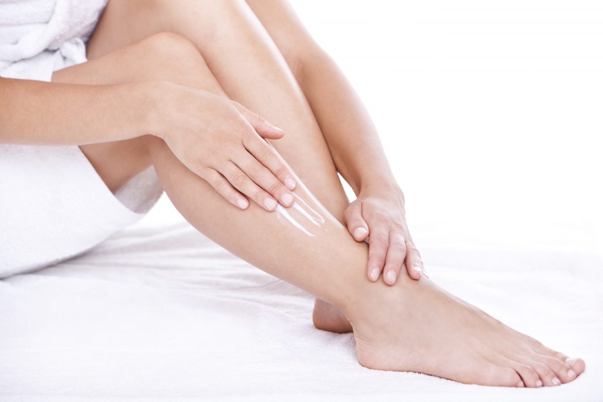 Freepik Woman Applying Moisturizer Cream Legs